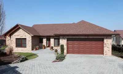 Completed Derby Strong Garage Doors installation in Louisville showing beautiful finished residential garage door enhancing home curb appeal and property value