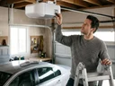 How do you reset a garage door opener after a power outage?