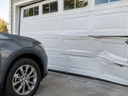 Can a garage door be repaired after a vehicle hits it in Alexandria, KY?