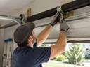 Can a garage door spring be replaced without new cables in Edgewood, KY?