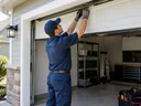 How often should a garage door get a professional tune-up in Winchester, KY?
