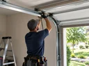 Can you reuse tracks with a new garage door in Lexington?