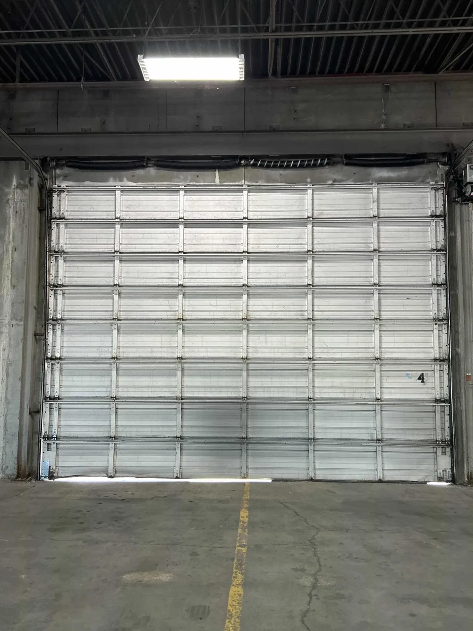 Retail and municipal overhead door service for storefront and fleet facilities
