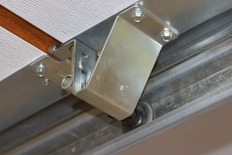 Garage door roller replacement hardware and hinge upgrade service