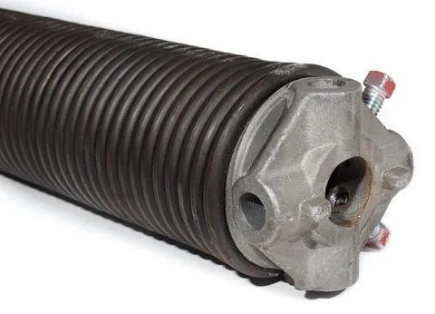 Licensed garage door professional safely replacing high-tension torsion spring with precision winding bars and safety equipment in Louisville home